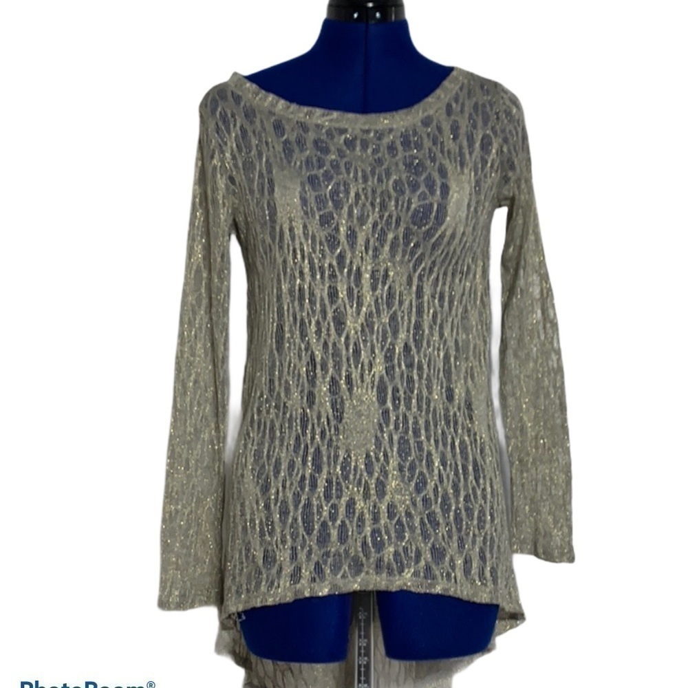 CORRECTION: Lovemarks Metallic Sheer Open Weave Top.